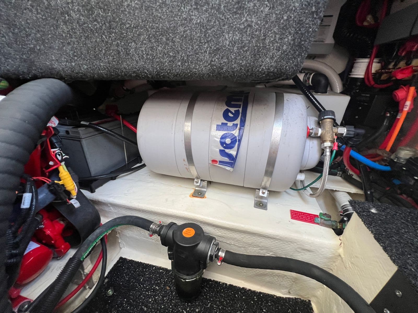 Isotemp marine hot water heater installed directly above the battery bank